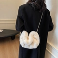 Chic white faux fur crossbody bag with a delicate gold chain strap for winter style - White