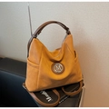 Detail of yellow tote bag with metallic M logo and adjustable brown leather straps - Orange
