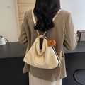 Versatile beige faux leather backpack with letter M embossing and cute bear charm - With Pendant / Off White