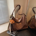 Vintage dark brown leather crossbody bag with M logo and chain strap detail - With Pendant / Brown
