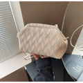 Chic cream pleated cloud bag featuring soft leather texture and slender shoulder strap - Off White