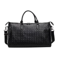 Large black woven leather duffel bag with handles and adjustable strap for travel - Black