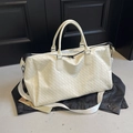 Off-white woven faux leather large travel tote bag with top handles and shoulder strap - Off White