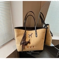 Detail of suede tote bag with MUHETI embroidery and creative dachshund leather charm - Khaki with Pendant
