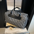 Borsa da viaggio grande in tela geometrica bianca e nera con dettagli in pelle nera - Nero