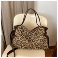 Large leopard print tote bag with brown leather trim and adjustable shoulder strap - Brown