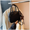 Black Boston bag in textured leather with Love & Luck logo and decorative charms - Black with Pendant