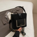 Black vintage bucket bag featuring a wide bohemian style shoulder strap and gold accents - Black without Pendant