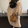 Leopard print bucket bag with brown leather handles and a puppy-shaped charm - Brown (With Pendant)