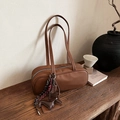 Dark brown leather bowling bag with sausage dog charm and woven accessories - With Charm / Brown
