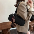Minimalist black matte bowling bag with cute dachshund charm and striped ribbon - With Charm / Black
