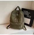 Detail of army green quilted backpack showing two front zipper pockets and side pockets - Army Green