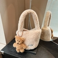Plush faux shearling bucket bag in beige with cute brown bear charm accessory - With Charm / Beige