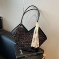 Brown leopard print tote bag with black leather trim and decorative scarf detail - Black