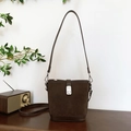 Vintage dark brown bucket bag in matte suede with leather trim and silver metal clasp - Small / Brown