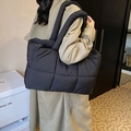 Chic black quilted puffer tote bag for women with large capacity and soft nylon finish - Black