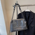 Chic silver gray metallic chain shoulder bag with engraved plaque on black suit backdrop - Black without Pendant