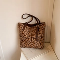Borsa tote con stampa leopardata, manici in pelle marrone e fibbie dorate regolabili - Marrone