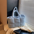 Stylish light blue quilted tote bag with padded texture and large capacity design - Blue