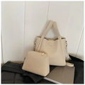 Detail of off-white lychee texture tote bag set with adjustable strap and inner pouch - Off White