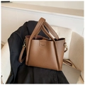Minimalist dark brown lychee leather tote bag with top handles and shoulder strap - Brown