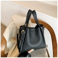 Minimalist black pebble leather tote bag with dual handles and adjustable shoulder strap - Black