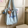 Light blue canvas tote bag with Dinghuo lettering and a cute brown bear charm - Blue with Charm