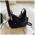Black leather crossbody bag with silver zippers and baseball charm accessory - With Charm / Black