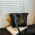 Minimalist black faux leather bucket bag with a cute brown teddy bear keychain charm - With Charm / Black