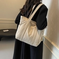 Minimalist beige quilted tote bag with fabric straps for women in casual commute style - Off-white