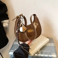 Brown high-shine patent leather hobo bag with gold plate and sporty baseball charm - With Charm / Brown