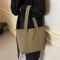 Olive green quilted nylon tote bag with wide padded straps and a relaxed silhouette - Green