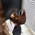 Brown leather half-moon shoulder bag with golden metal plate and animal charm - With Charm / Brown
