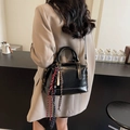 Vintage black glossy pillow bag with white contrast stitching and braided rope charms - Black (With Charm)