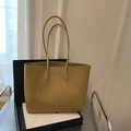 Minimalist mustard yellow leather tote bag with long handles in a spacious commuter design - Khaki