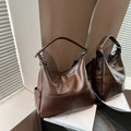 Grande borsa hobo vintage marrone scuro con cuciture a croce e tasche laterali vista specchio - Marrone