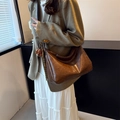 Dark brown crescent shoulder bag in vintage oiled leather with small bear pendant - With Pendant / Brown