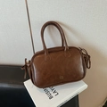 Dunkelbraune Retro-Boston-Handtasche aus PU-Leder mit zylindrischen Griffen und Kordelzug - Braun