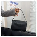 Mini borsa a cilindro nera in pelle con grana litchi e cerniera in metallo argento - Nero