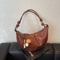 Brown half-moon crossbody bag with white stitching, knot strap and baseball charm - Caramel Brown (With Charm)