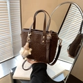 Dark brown plush bucket bag with fuzzy shearling texture and cute pom-pom charm detail - With Charm (ZL-1601) / Brown