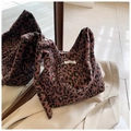 Pink and brown leopard print plush tote bag with a trendy knotted shoulder strap - Leopard Print