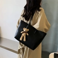 Large black leather tote bag with a cute knit bear pendant for stylish commuting - With Charm / Black