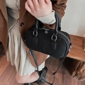 Classic black crossbody pillow bag in canvas material with silver metallic zipper - Black