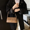 Brown faux leather underarm bag with leopard print flap and metal buckle detail - Brown Leopard Print