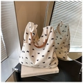 Elegante bolso tote de lona crema con lazos negros y asas de cuero marrón - Blanco con Lazo