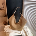 Minimalist camel tote bag in thick canvas material with a leather patch detail - Khaki