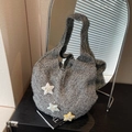 Sparkly grey knitted tote bag with colorful star patches and a bow accent - Gray