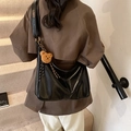 Glossy black hobo shoulder bag with wide strap and a cute brown plush bear charm - Black with Pendant