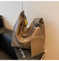 Detail of large brown shoulder bag with white stitching and yellow lining insert - Elephant Gray